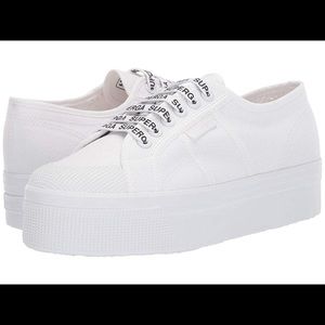 Superga white out platform sneakers